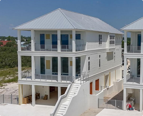shot of white house on the beach